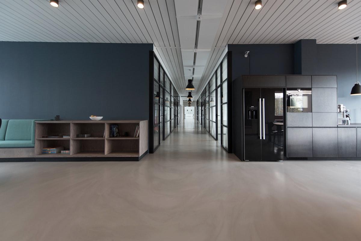 Modern law office with bookshelves and meeting table